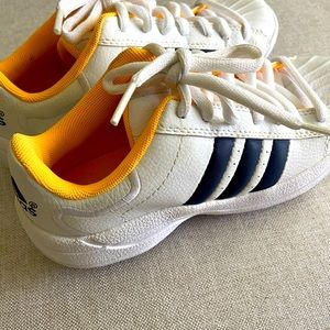 - Adidas Golf shoes.